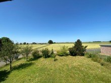 Ausblick auf die Felder Modernes Einfamilienhaus in Bedburg-Kirchherten zu verkaufen.